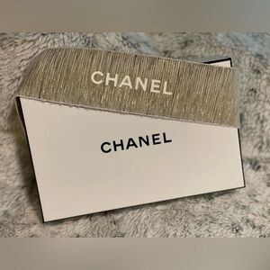 Chanel box with gold ribbon